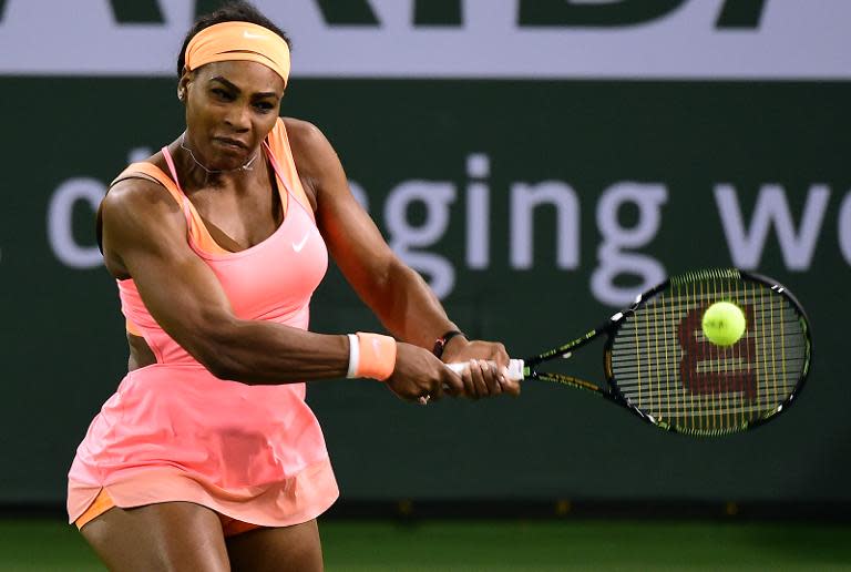 Serena Williams of the US hits a backhand return at the BNP Paribas Tennis Open in Indian Wells, California on March 18, 2015