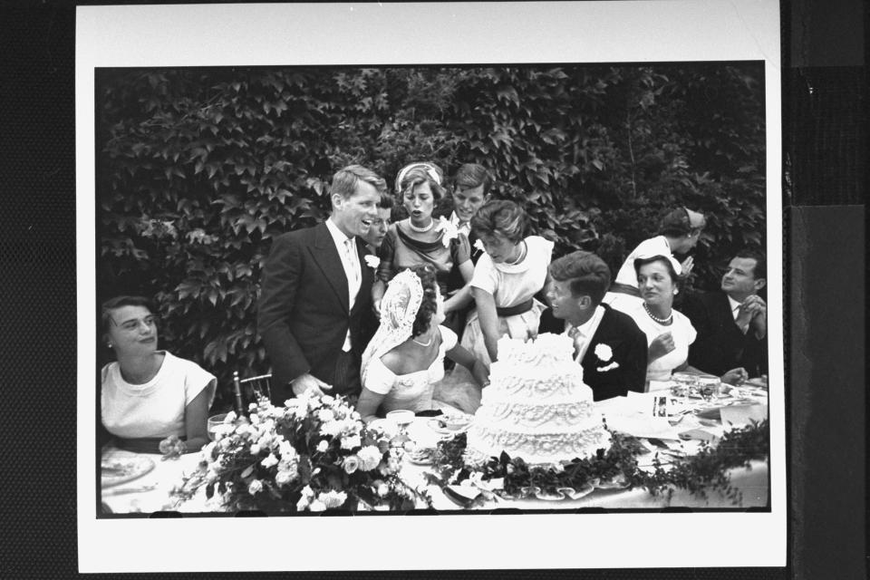 Sen. John F. Kennedy with his bride Jacqueline at their wedding reception. (Photo by Lisa Larsen//Time Life Pictures/Getty Images)