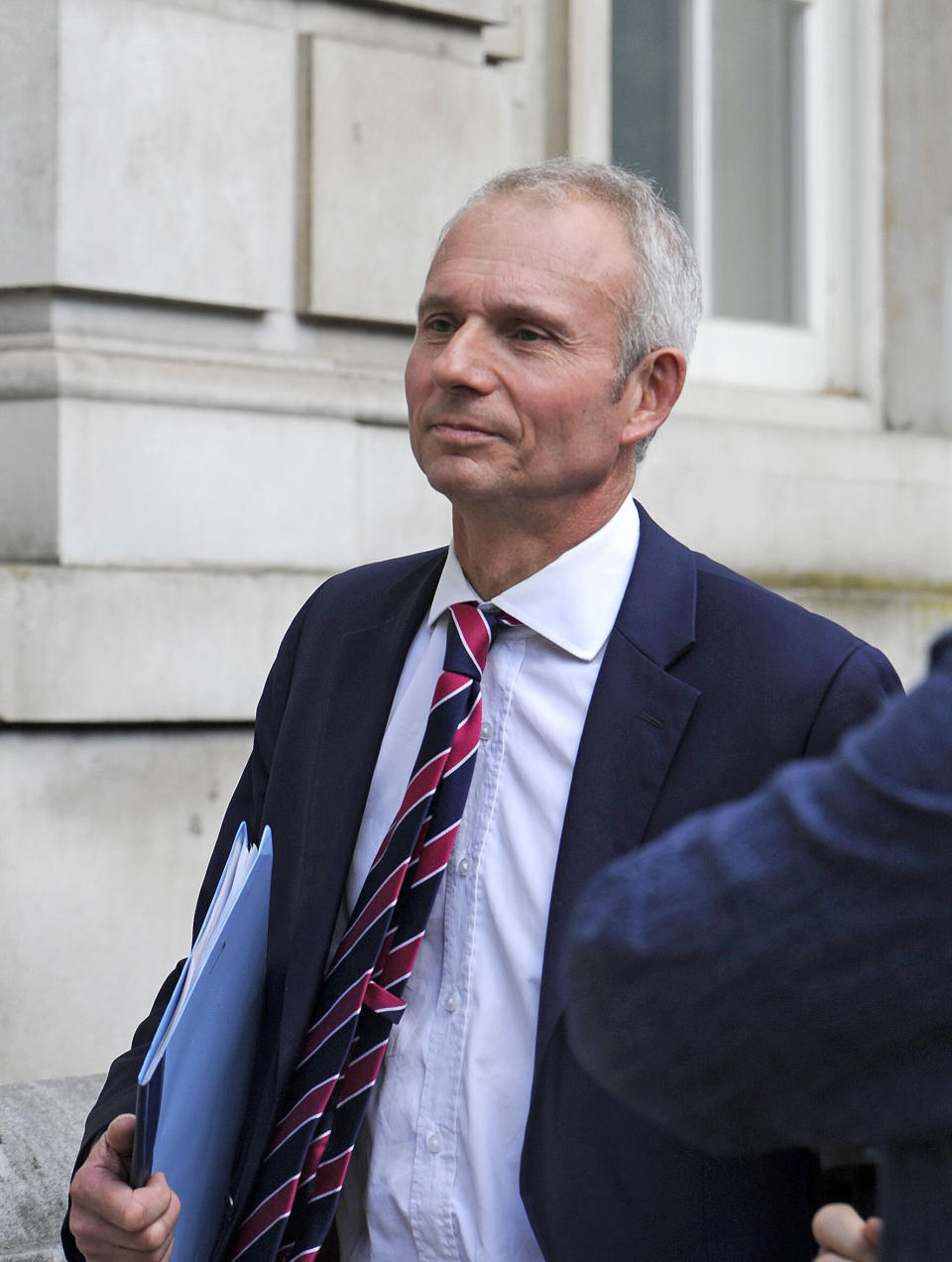 Minister of State at the Foreign &amp; Commonwealth Office David Liddington leaves the Cabinet Office in Whitehall, London, as Prime Minister David Cameron chaired a meeting with Chancellor George Osborne, Bank of England governor Mark Carney and other senior officials to assess the likely impact of the Greek referendum vote to reject the austerity terms demanded by its international creditors on the UK.