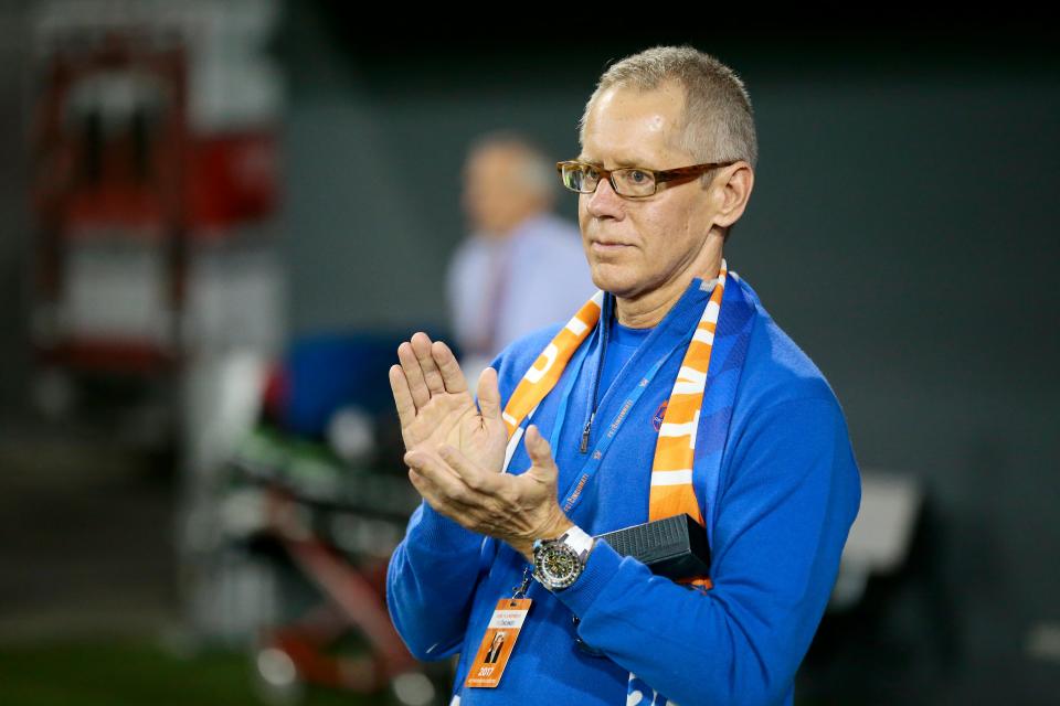 FC Cincinnati owner and CEO Carl H. Lindner III claps for his team after the match.