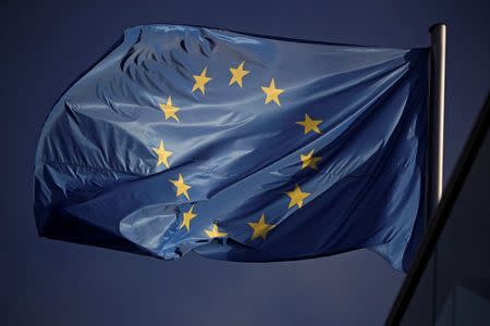 An European Union flag flutters above the Germany's Christian Democratic Union party (CDU) headquarters after first poll results of the European Parliament elections in Berlin, Germany, May 26, 2019. REUTERS/Hannibal Hanschke