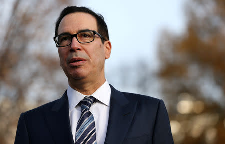 FILE PHOTO: U.S. Treasury Secretary Steven Mnuchin speaks to the news media after giving a television interview at the White House in Washington, U.S. December 3, 2018. REUTERS/Leah Millis