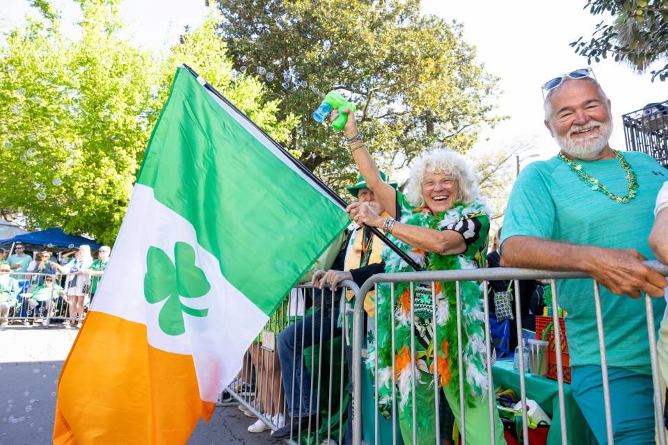 Cheryl Hodge of Savannah says she's been to more than 50 St. Patrick's Day Parades. She can usually be found blowing bubbles and waving a flag near Oglethorpe Square.