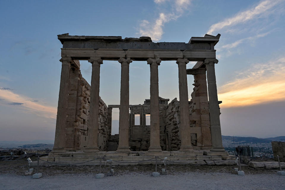 photo of ancient temple on Acropolis hill (Milos Bicanski / Getty Images)