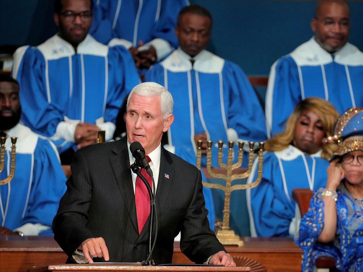 Vice President Mike Pence speaks to the Holy City Church of God In Christ congregation during his trip to Memphis on Sunday, Jan. 19, 2020. Pence spoke at the church service in remembrance of the Rev. Martin Luther King Jr., the day before the federal holiday named after the civil rights leader. Pence says King touched the hearts of millions of Americans and his words continue to inspire. Pence acknowledged the nation's deep divide and says Americans must rededicate themselves to the ideals that King advanced. (Patrick Lantrip/Daily Memphian via AP)