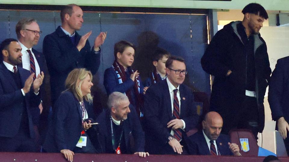 PHOTO: Prince William and Prince George watch Tyrone Mings of Aston Villa during the UEFA Europa Conference League 2023/24 Quarter-final first leg match between Aston Villa and Lille OSC at Villa Park on April 11, 2024 in Birmingham, England. (Marc Atkins/Getty Images)