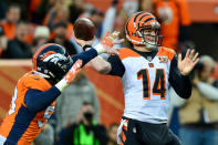 <p>Quarterback Andy Dalton #14 of the Cincinnati Bengals passes under pressure by outside linebacker Von Miller #58 of the Denver Broncos at Sports Authority Field at Mile High on November 19, 2017 in Denver, Colorado. (Photo by Dustin Bradford/Getty Images) </p>