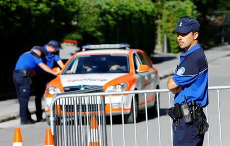 A police officer looks on ahead of peace talks on divided Cyprus under the supervision of the United Nations in the alpine resort of Crans-Montana, Switzerland June 28, 2017. REUTERS/Denis Balibouse