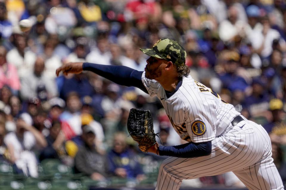 Milwaukee Brewers starting pitcher Freddy Peralta thorws during the first inning of a baseball game against the Washington Nationals Sunday, May 22, 2022, in Milwaukee. (AP Photo/Morry Gash)