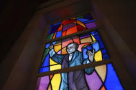 A stained-glass window honors the founder of the African Methodist Episcopal Church denomination, Richard Allen, at Bethel AME Church on Tuesday, April 11, 2023, in Pittsburgh. (AP Photo/Jessie Wardarski)