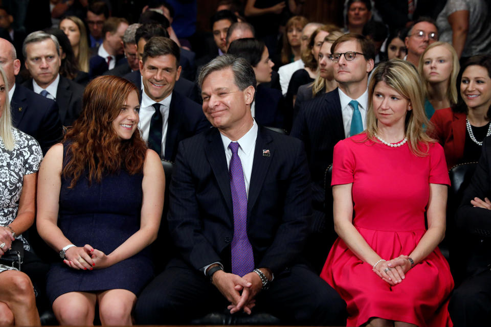 Christopher Wray is seated with his daughter Caroline, left, as he prepares to testify at&nbsp;a Senate Judiciary Committee confirmation hearing on his nomination to be the next FBI director on July 12, 2017.