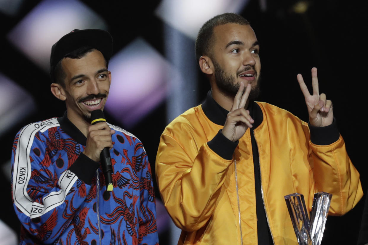 French rapper duet Bigflo & Oli celebrate as they receive the best male artist award during the 34th Victoires de la Musique, the annual French music awards ceremony, on February 8, 2019 at the Seine Musicale concert hall in Boulogne-Billancourt, on the outskirts of Paris. (Photo by Thomas SAMSON / AFP)        (Photo credit should read THOMAS SAMSON/AFP via Getty Images)