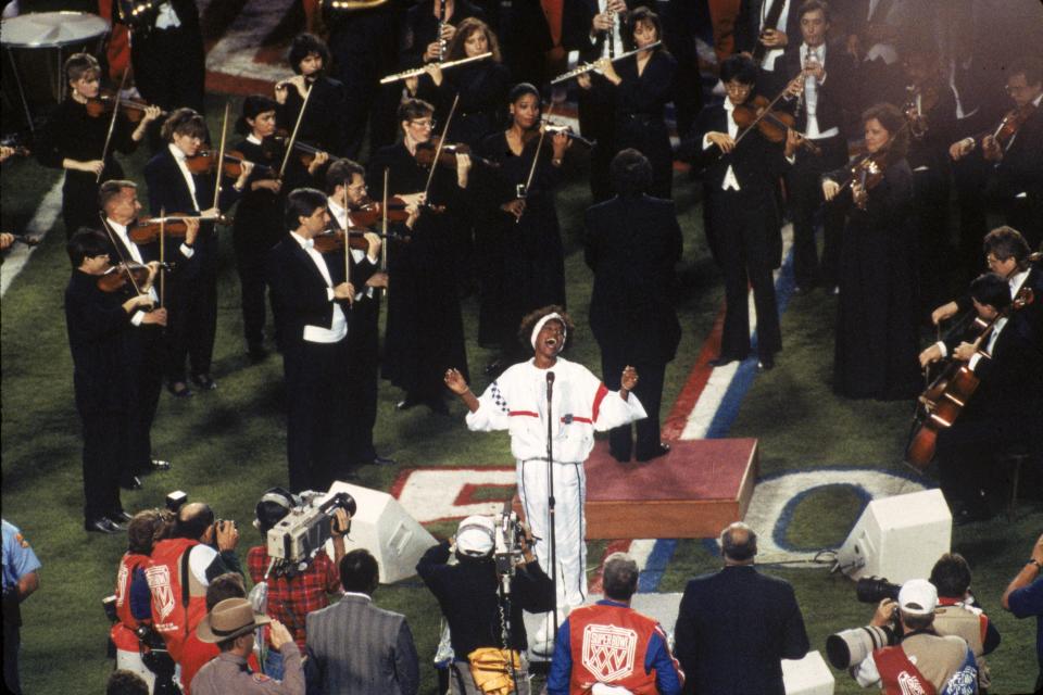 The Florida Symphony Orchestra helped provide the sound behind Whitney Houston at Super Bowl XXV at Tampa Stadium in 1991. (Photo by Gin Ellis/Getty Images)