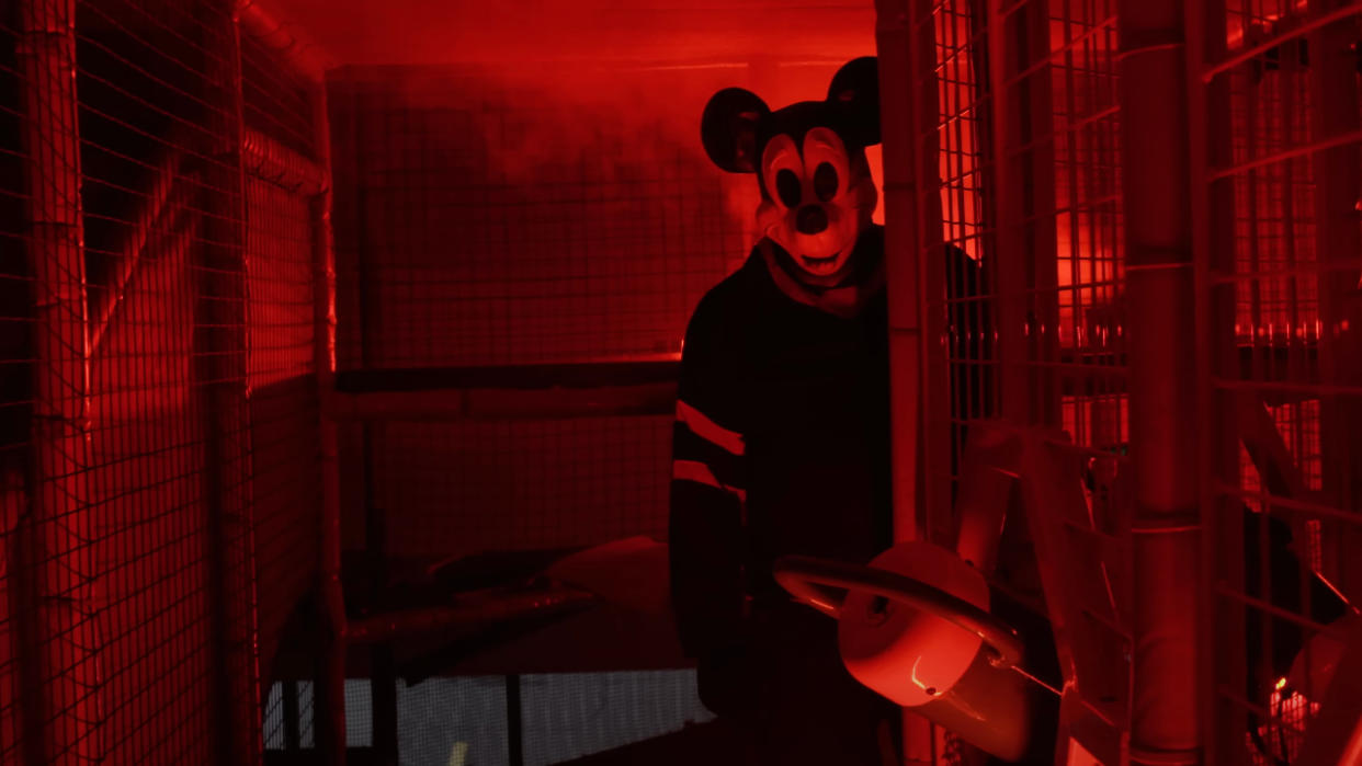  A murderer dressed as Mickey Mouse from the new film Mickey's Mouse Trap. 