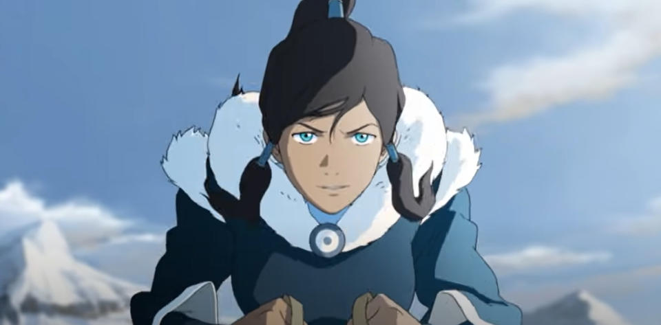 Animated character Korra from "The Legend of Korra" appears in a winter outfit