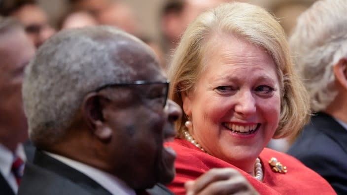 Associate Supreme Court Justice Clarence Thomas sits with his wife, conservative activist Virginia Thomas, last year at the Heritage Foundation in Washington, D.C. (Photo: Drew Angerer/Getty Images)