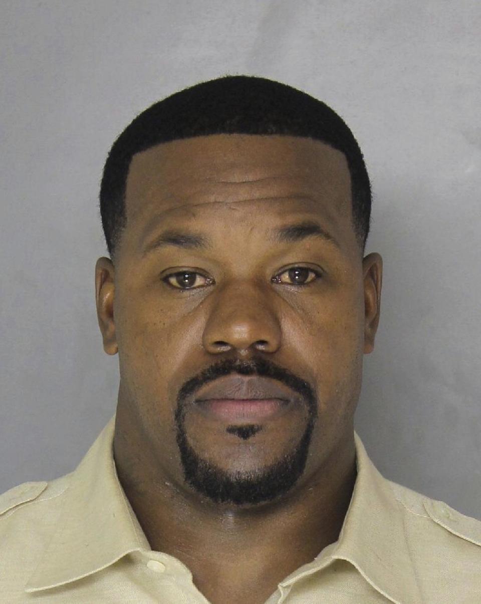 This photo provided by the Pittsburgh Department of Public Safety shows Pittsburgh Steelers assistant coach Joey Porter after he was arrested Sunday, Jan. 8, 2017. Porter was charged early Monday, Jan. 9, with assaulting a doorman at a bar and a police officer who intervened hours after the team's wild card win over the Miami Dolphins. (Pittsburgh Department of Public Safety via AP)
