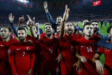 Turkey's players celebrate after their Euro 2016 Group A qualification soccer match against Iceland in Konya, Turkey, October 13, 2015. REUTERS/Umit Bektas