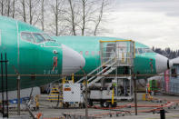 Two Boeing 737 MAX 8 aircraft are parked at a Boeing production facility in Renton, Washington, U.S., March 11, 2019. REUTERS/David Ryder