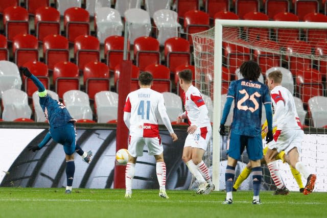 Alexandre Lacazette, left, scores his second of the evening