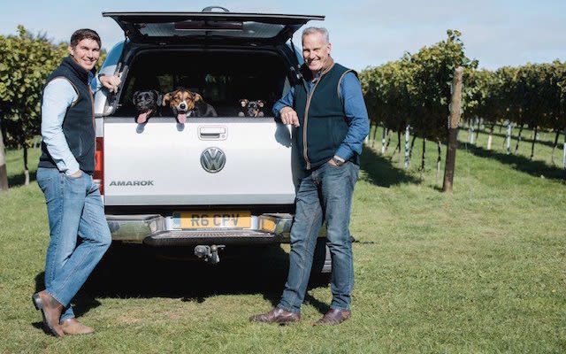 Charles, pictured here with his son Robert, makes 30,000 bottles of sparkling wine a year in his family vineyard