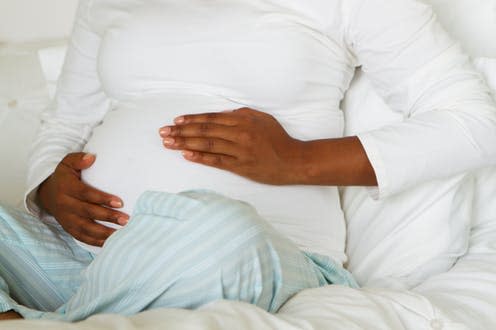 <span class="caption">Perinatal anxiety can happen during pregnancy and up to one year after giving birth. </span> <span class="attribution"><a class="link " href="https://www.shutterstock.com/image-photo/african-american-pregnant-woman-looking-holding-484129675" rel="nofollow noopener" target="_blank" data-ylk="slk:pixelheadphoto digitalskillet/ Shutterstock;elm:context_link;itc:0;sec:content-canvas">pixelheadphoto digitalskillet/ Shutterstock</a></span>