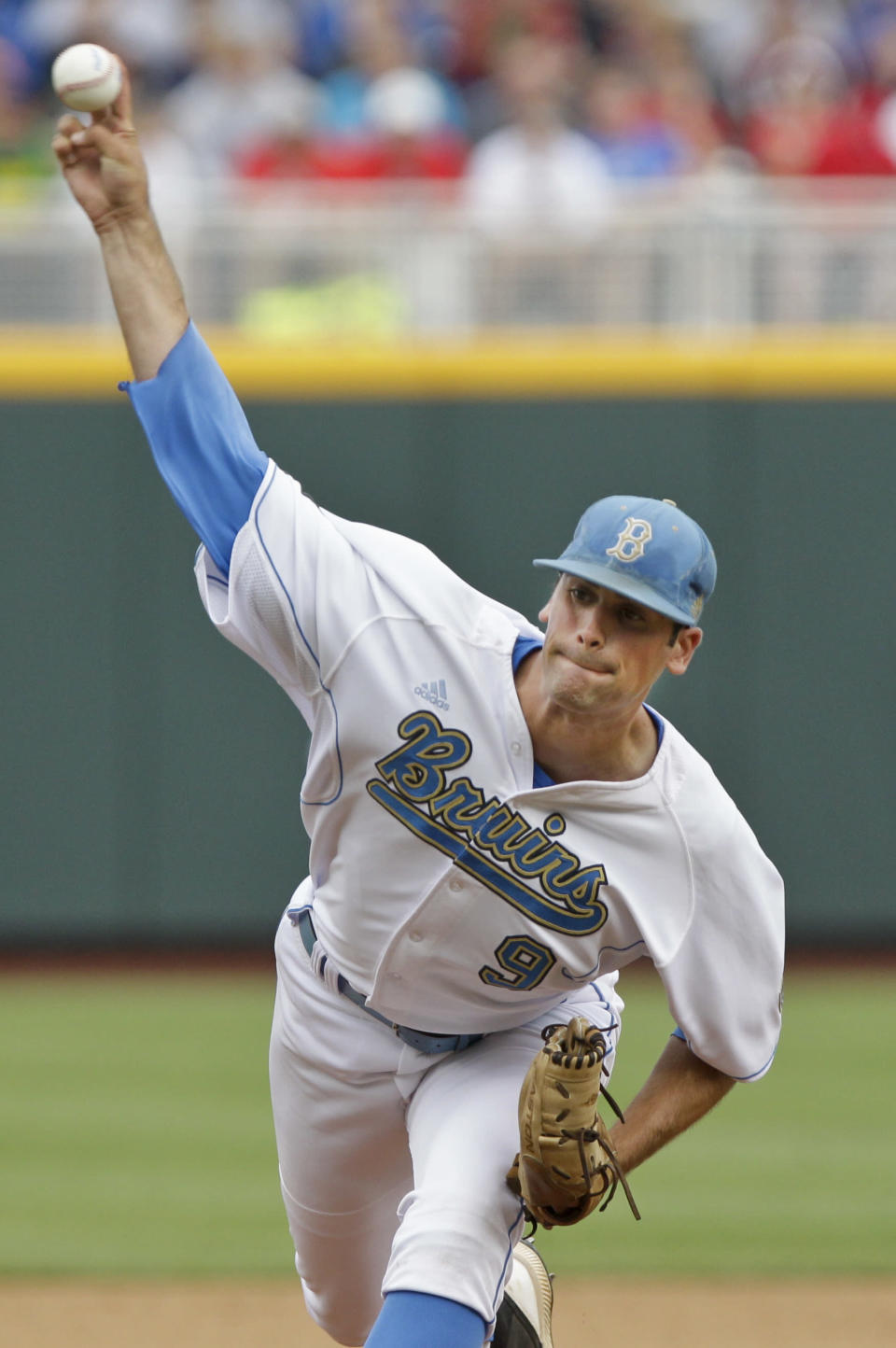 UCLA's starting pitcher Adam Plutko works against Stony Brook in the first inning of an NCAA College World Series baseball game in Omaha, Neb., Friday, June 15, 2012. (AP Photo/Nati Harnik)