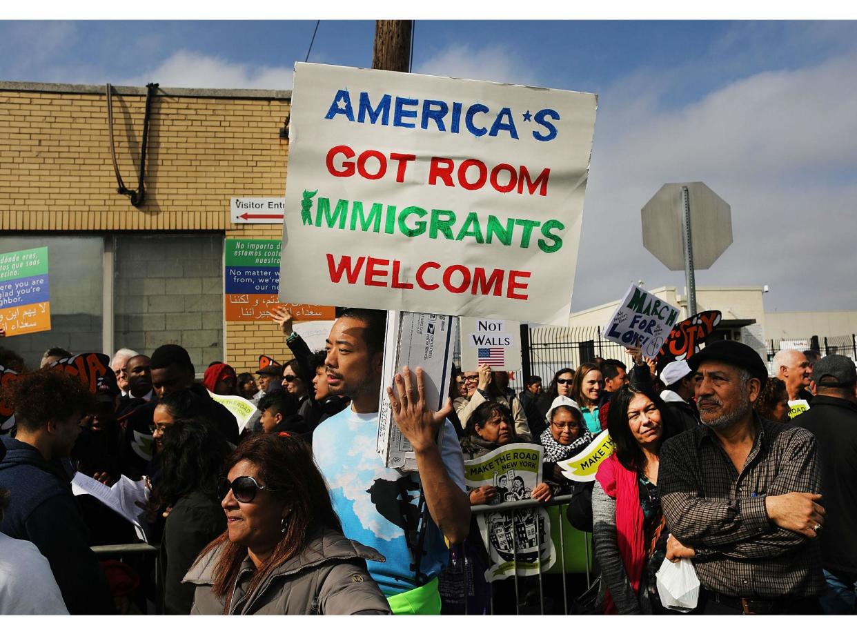 Pro-immigration protesters pictured at a rally in New Jersey: Getty