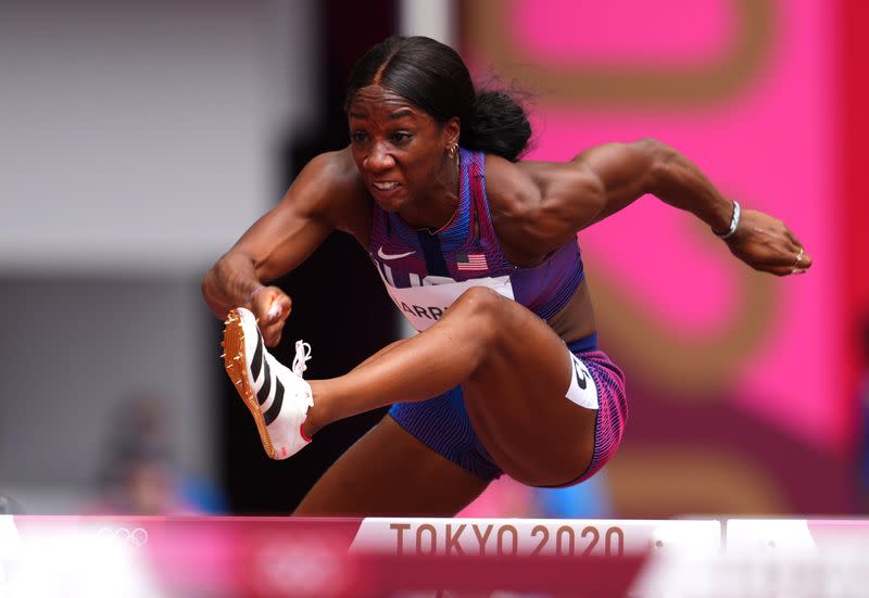 Athletics - Women's 100m Hurdles - Round 1