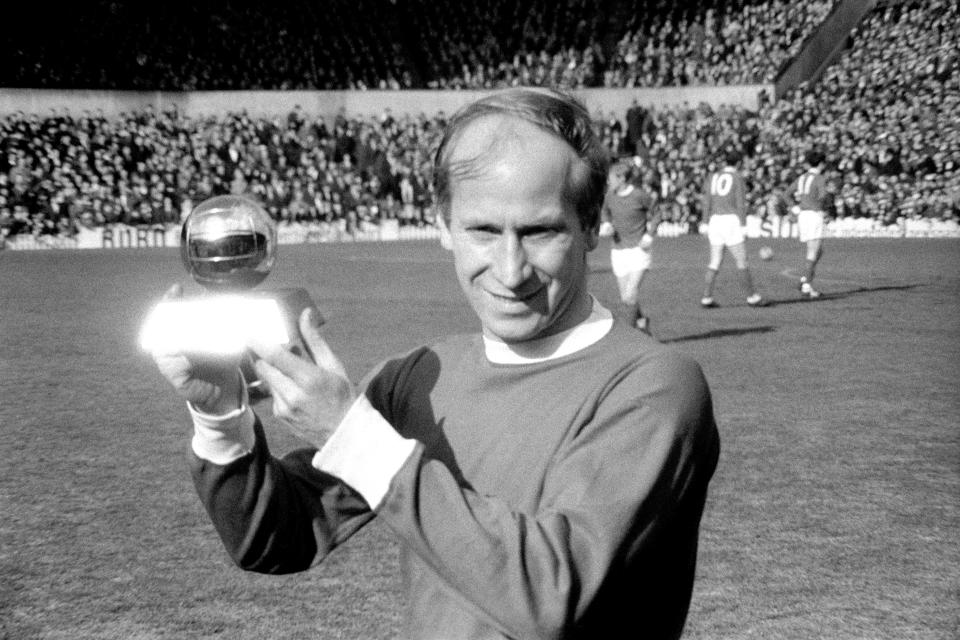 Manchester United’s Bobby Charlton with the 1966 European Footballer of the Year trophy