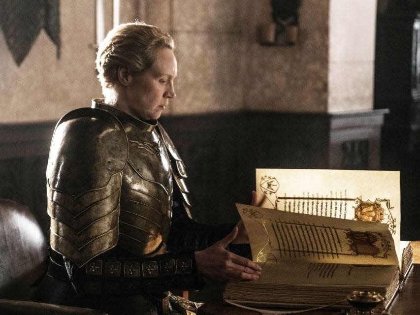 Brienne writing in book