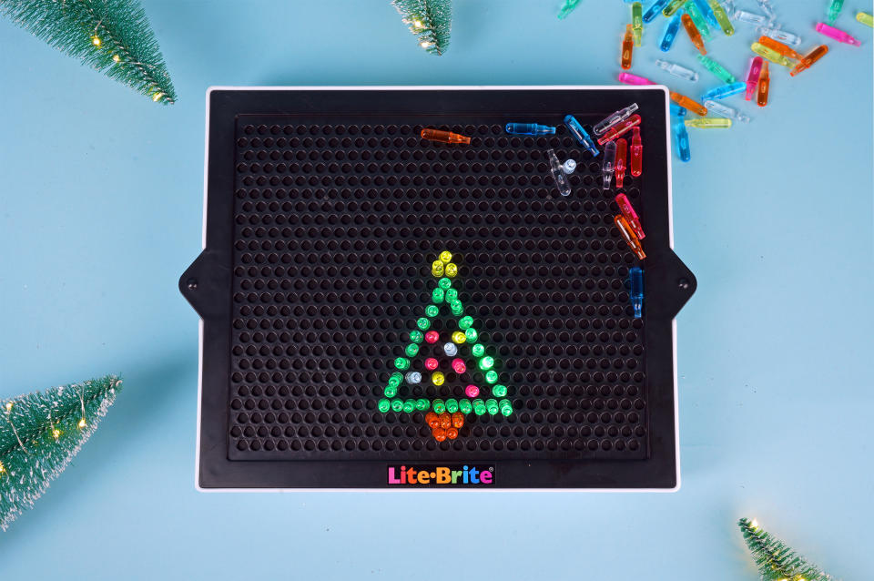 close-up view of lite brite with christmas tree