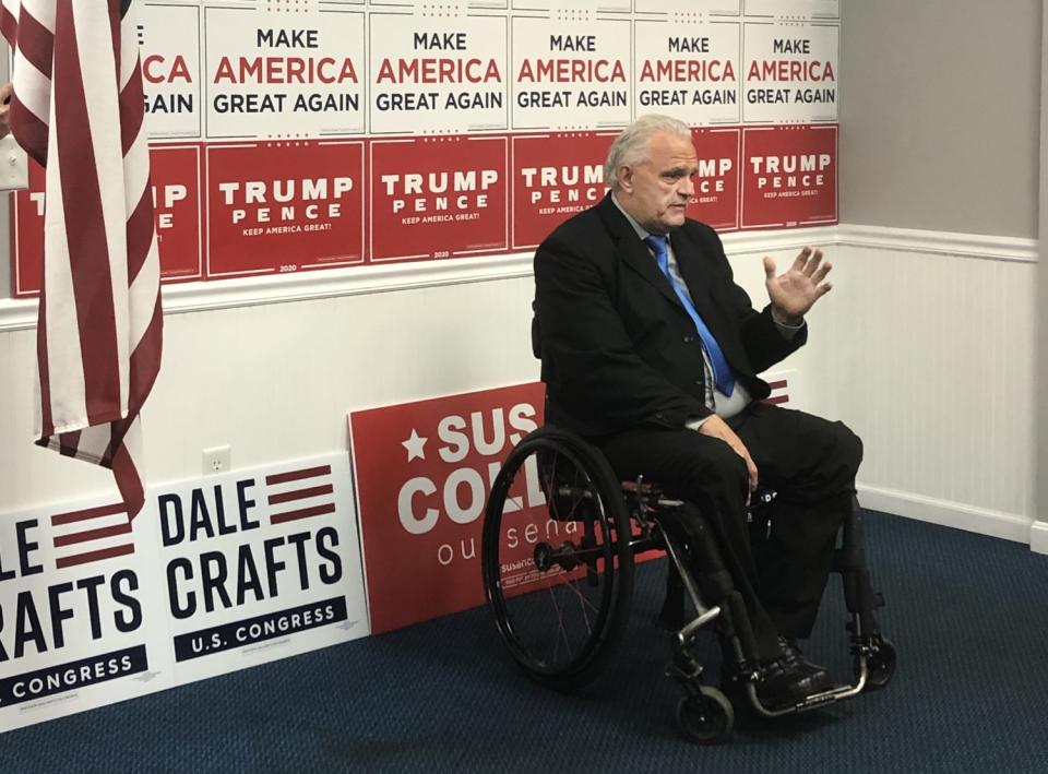 Dale Crafts, a Republican House candidate in Maine, speaks to GOP volunteers before they go door knocking in Bangor.