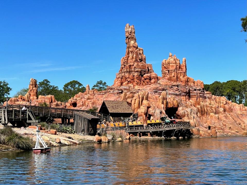 Big Thunder Mountain sits across the water from Tom Sawyer Island at Magic Kingdom.