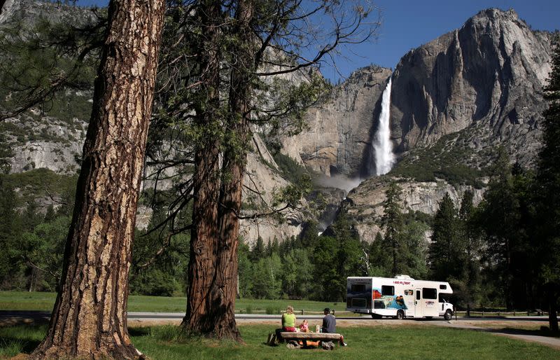 FILE PHOTO: Family has picnic in view of Yosemite Falls in Yosemite National Park