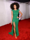 <b>Solange Knowles</b><br> <b>Grade: B+</b><br> While her sister went for a basic black-and-white pantsuit, Solange Knowles added a pop of color in an emerald green gown with exaggerated shoulders, which she paired with neon orange (and studded!) heels. Which Knowles sister do you think looked better at the Grammys?