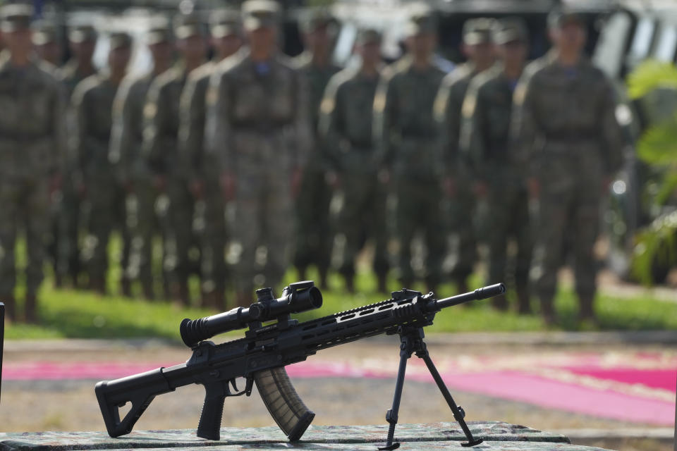 A Chinese military weapon is displayed during the Golden Dragon military exercise in Svay Chok village, Kampong Chhnang province, north of Phnom Penh Cambodia, Thursday, May 16, 2024. Cambodia and China on Thursday kicked off their annual Golden Dragon military exercise to strengthen cooperation and exchange military experiences. (AP Photo/Heng Sinith)