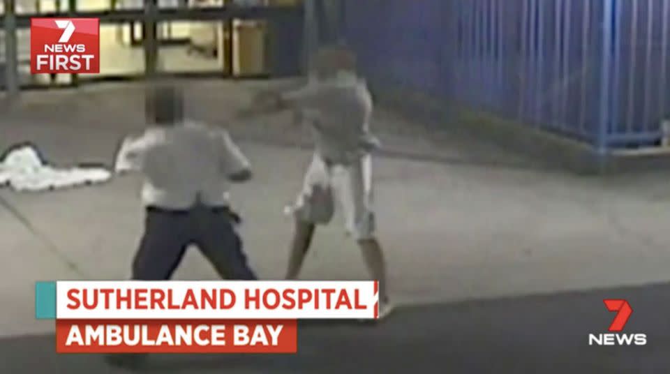 A patient throws a punch in the ambulance bay. Source: 7 News