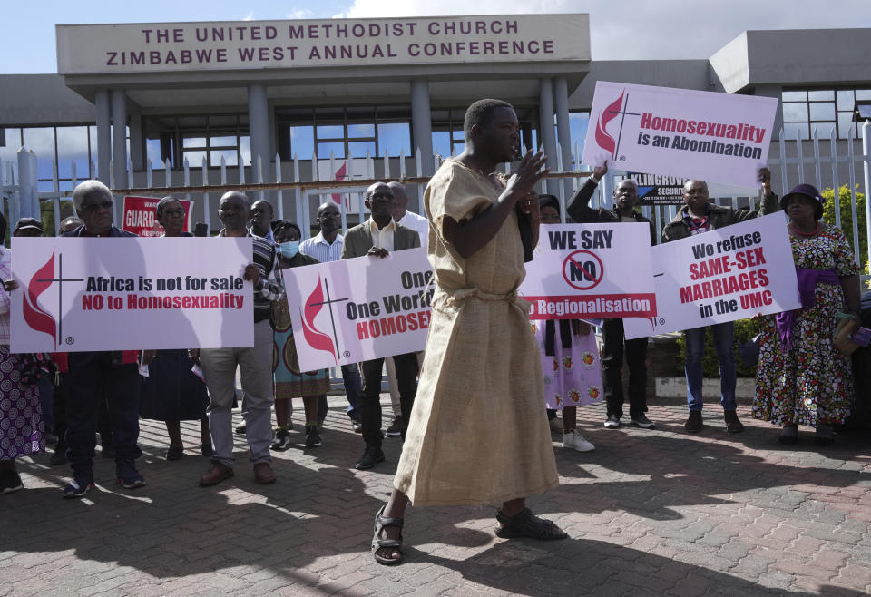 Members of the United Methodist Church in Zimbabwe hold placards while holding a protest at the church premises in Harare, Thursday, May 30, 2024. The protests denouncing homosexuality and the departure of the church from the scriptures and doctrine, come barely a month after the United Methodist Church Worldwide General Conference held in North Carolina, US repealed their church's longstanding ban on LGBTQ clergy, removing a rule forbidding "self-avowed practising homosexuals" from being ordained or appointed as ministers. (AP Photo/Tsvangirayi Mukwazhi)