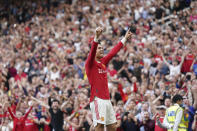 FILE - Manchester United's Cristiano Ronaldo celebrates after scoring his third goal during the English Premier League soccer match between Manchester United and Norwich City at Old Trafford stadium in Manchester, England, Saturday, April 16, 2022. Saudi Arabian soccer club Al Nassr on Friday, Dec. 30, 2022, announced the signing of Ronaldo, ending speculation about the five-time Ballon d'Or winner's future. (AP Photo/Jon Super, File)