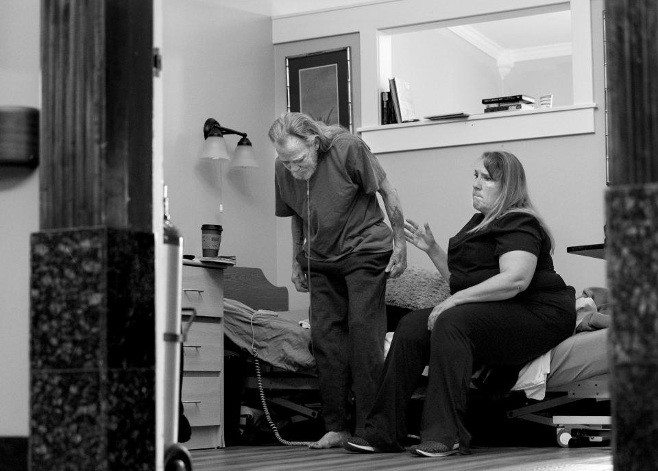 Symbii Hospice nurse Lori Mills visits her patient, Paul Youngblood, at The INN Between in Salt Lake City on Tuesday, June 6, 2023. The inn works with local hospice staffs while providing residents a safe haven as they are dying. | Laura Seitz, Deseret News