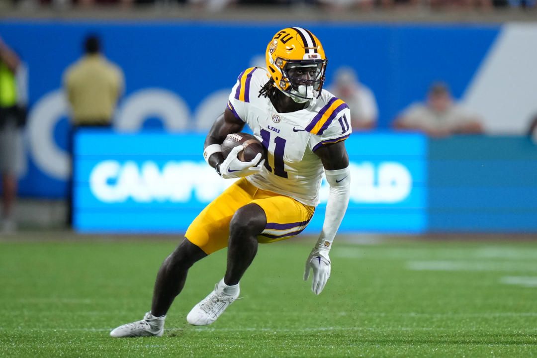 ORLANDO, FL - SEPTEMBER 03: *LSU Tigers wide receiver Brian Thomas Jr. (11) runs after a catch during the Camping World Kickoff game between the LSU Tigers and the Florida State Seminoles, on Sunday, September 3, 2023 at Camping World Stadium in Orlando, Fla. (Photo by Peter Joneleit/Icon Sportswire via Getty Images)