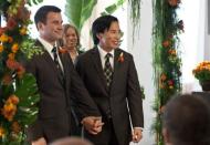 Phil Fung (R) and Shawn Klein, life-partners of 18 years, walk down the aisle after their marriage ceremony on the 61st floor of the Empire State Building in New York, February, 14, 2012.