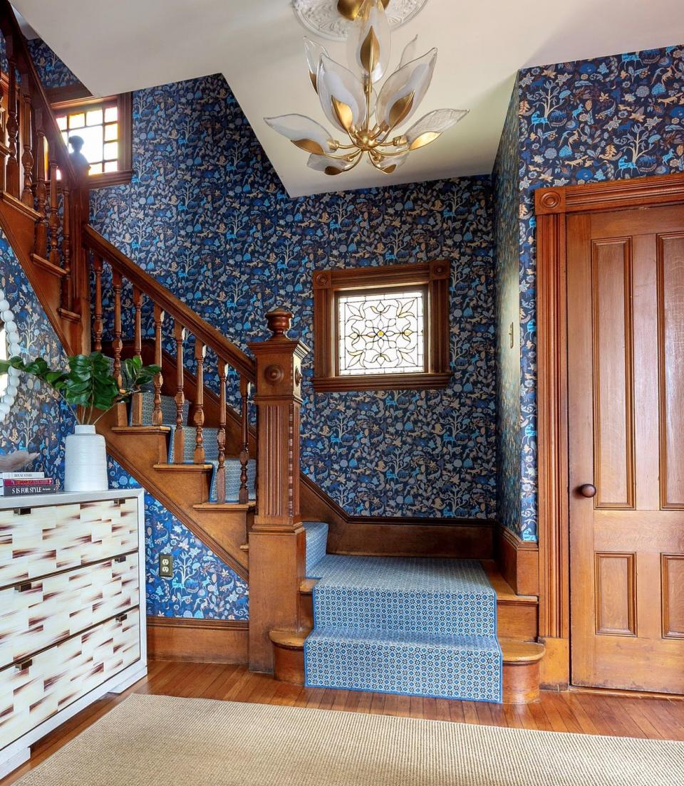 entry with floral wallpaper