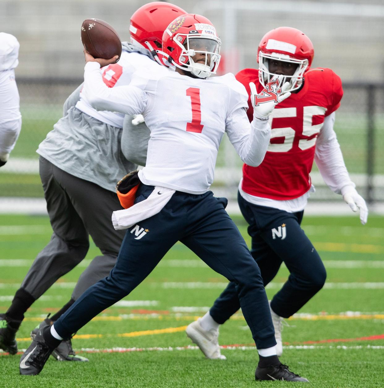 New Jersey Generals quarterback De'Andre Johnson throws a pass in practice at the Pro Football Hall of Fame Friday, March 24, 2023.