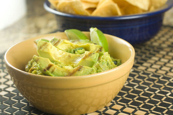 <strong>Get the <a href="http://www.macheesmo.com/2012/06/grilled-guacamole/" target="_blank">Grilled Guacamole recipe</a> from Macheesmo</strong>