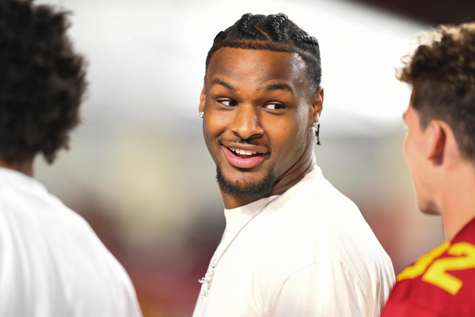 USC basketball player Bronny James jokes during a football game between the San Jose State Spartans and the USC Trojans on Aug. 26. (Brian Rothmuller/Icon Sportswire via Getty Images)