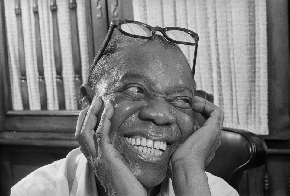 Jazz musician Louis Armstrong smiles as he recalls the old days during an interview at his home in Queens, New York, on June 10, 1970.