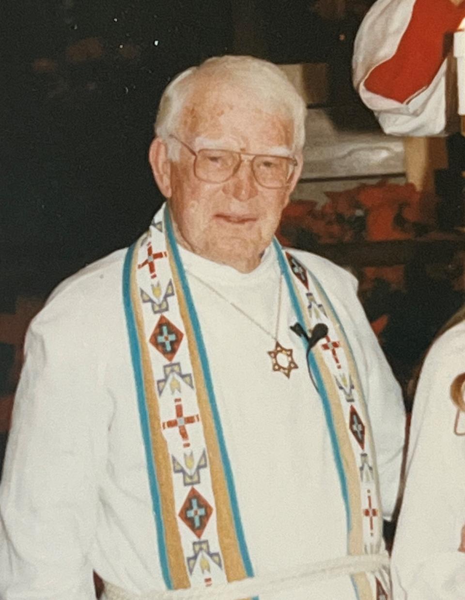
            man in priest robes

        