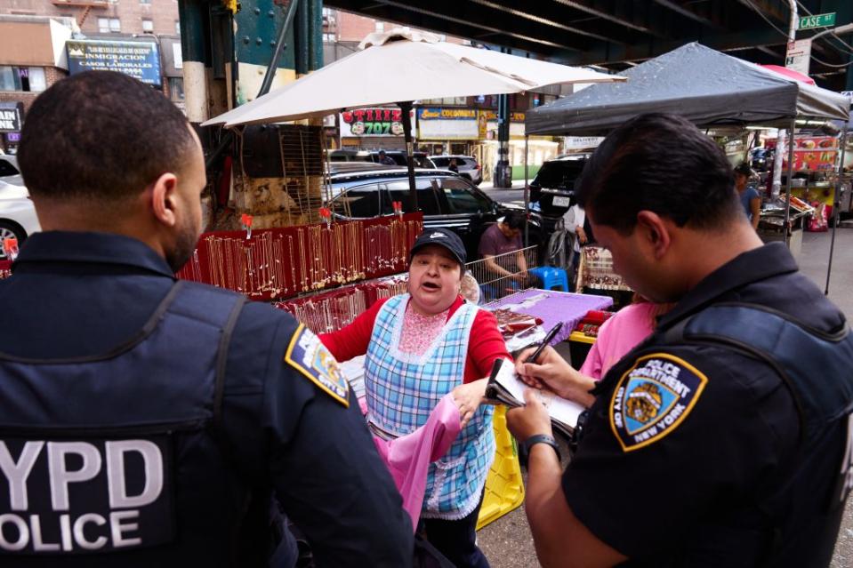On Tuesday, cops were back at it on a triangular block bound by Roosevelt Avenue, Elmhurst Avenue and 91st Street around to scoop up apparel items from about 10 vendors who displayed apparently stolen wares on blankets for sale. James Keivom